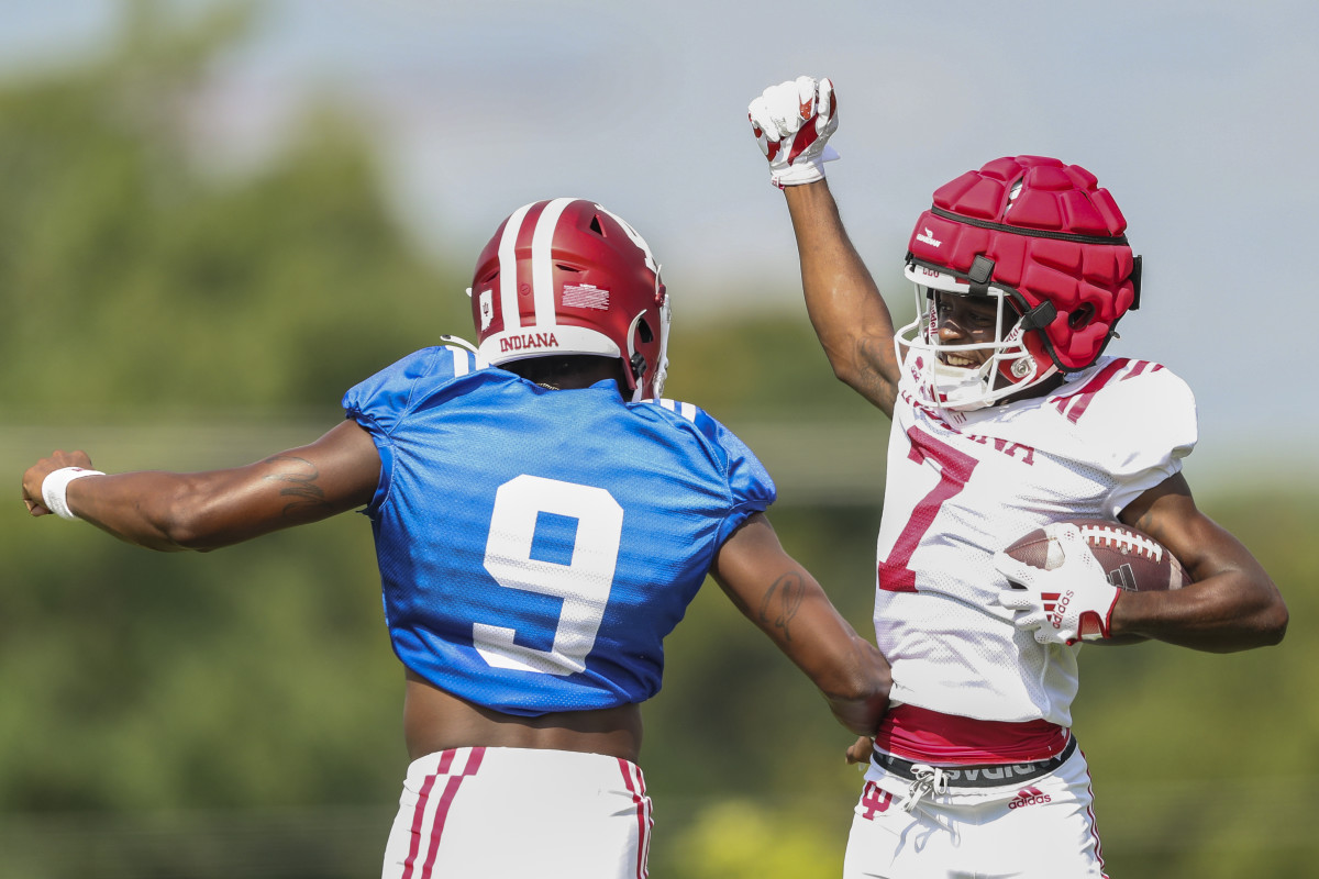 D.J. Matthews celebrates with Michael Penix Jr. during Indiana's fall camp on Aug. 20.